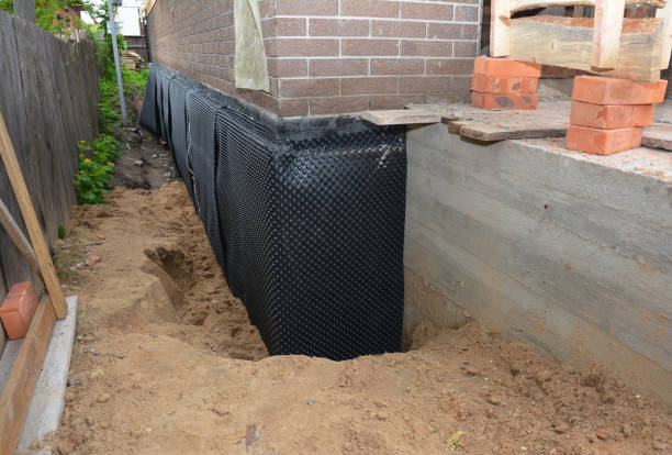 SJ Waterproofing Pros technician performing targeted Exterior Waterproofing assessment in Saint Nazianz, WI